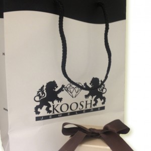 A bag with Koosh Jeweler's brand name for your jewelry or watches