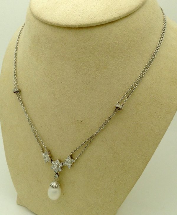 1.00ct VS Diamond 14k White Gold Cluster Necklace w/ 11mm South Sea Pearl hanging on a fake neck