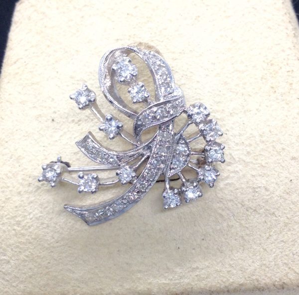 Front view of 1.00 Ct Diamond Antique Brooch 14k White Gold 1" Long on a jewelry vox