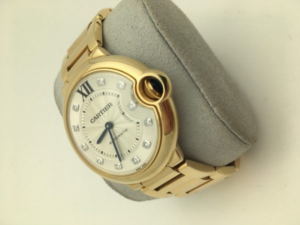 Side view of 18K Gold with Factory Diamonds Cartier Ballon bleu 36mm watch