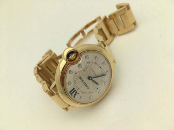 Front view of 18K Gold with Factory Diamonds Cartier Ballon bleu 36mm watch