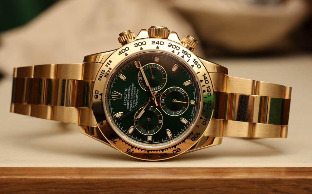 A used designer watch with gold color