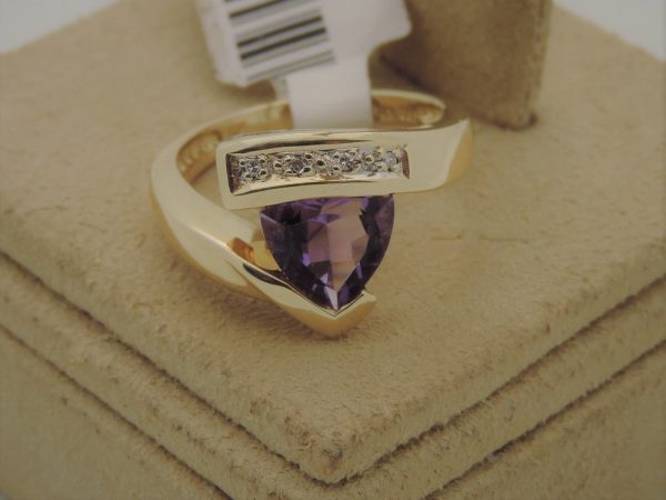 2.50 Ct Amethyst with 0.05 Ct Diamond Vintage Statement Ring 14k on a piece of carton