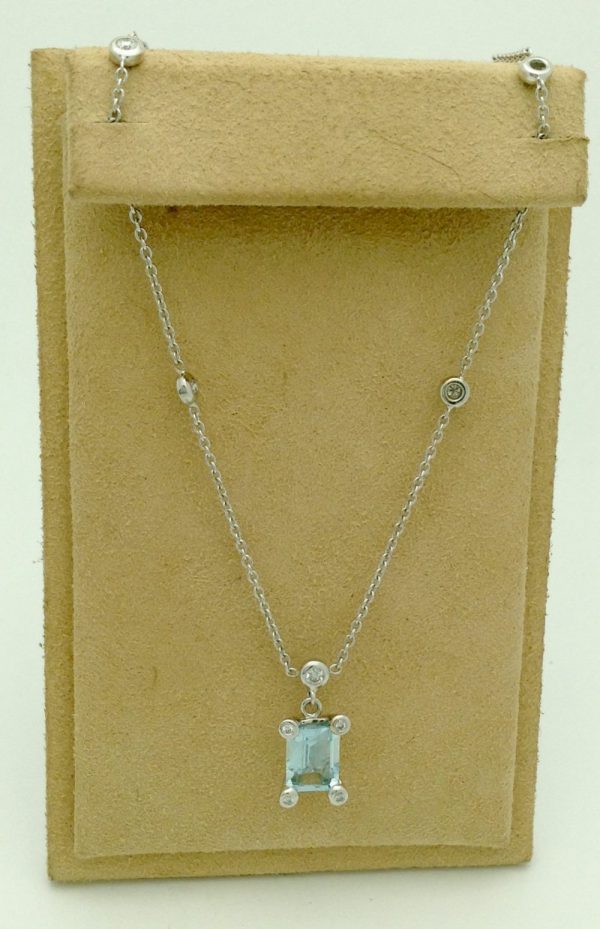 2.50 Ct Aquamarine with 0.26 Ct Diamonds Classy Retro Necklace 18k hanging on a piece carton