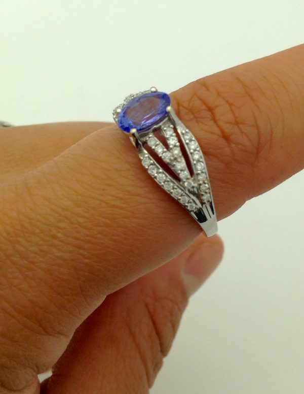 0.25 Ct Tanzanite and 0.44 Ct Diamond Contemporary Ring 14k on a finger