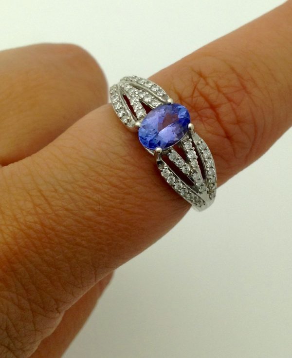0.25 Ct Tanzanite and 0.44 Ct Diamond Contemporary Ring 14k on a finger