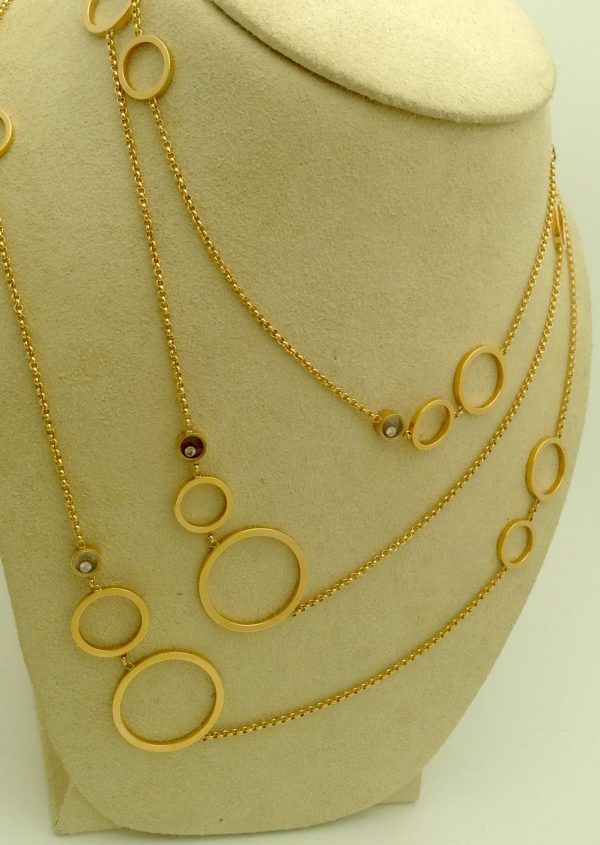 Gold Sautoir Necklace By CHOPARD with a lot of heart shapes