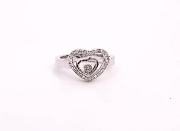 Front view of a ring with 1 small heart inside a bigger heart with gemstones