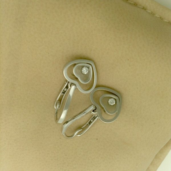 Chopard Happy Hearts White Gold Diamond Earrings 18k on a pillow