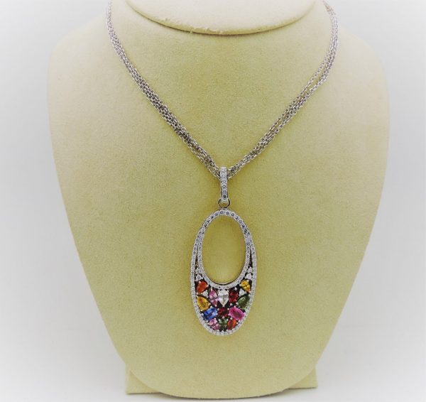 7.00 Ct Sapphire Cocktail Necklace 18k 1.00 Ct Diamonds hanging on a carton neck
