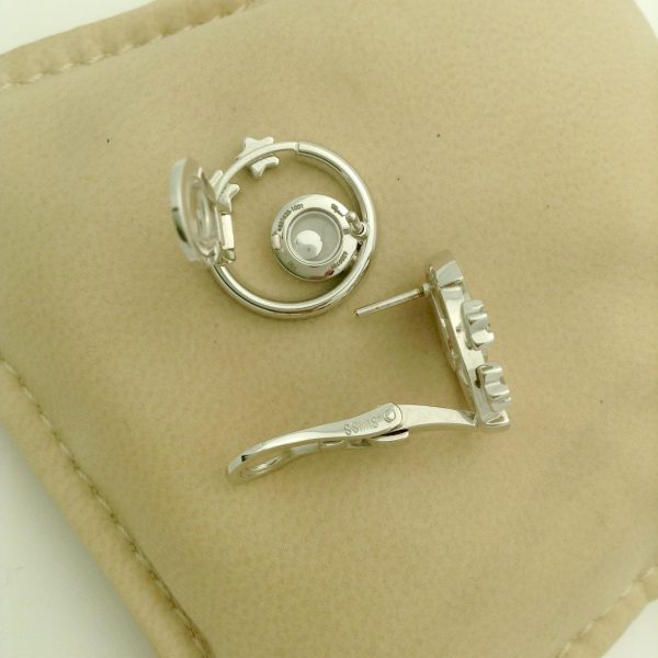 Happy Diamonds Stars By Chopard 18k White Gold Earrings on a pillow