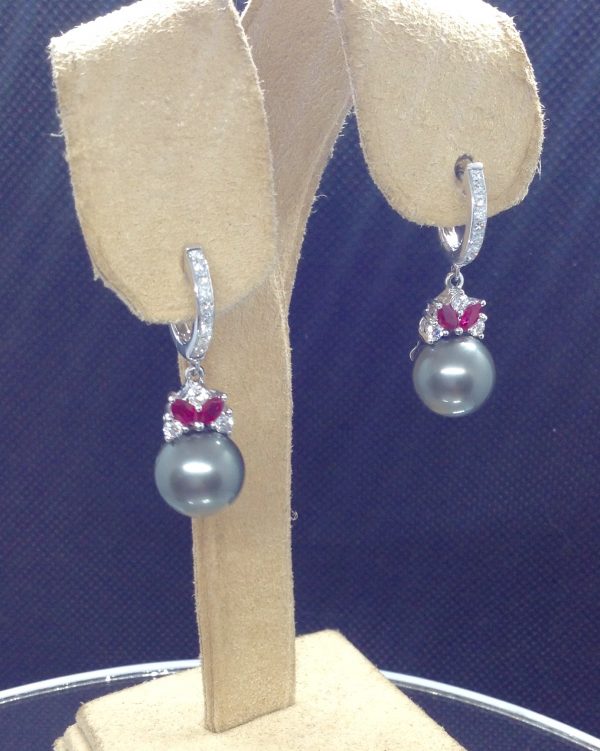 18k White Gold Short Drop Tahitian 11mm Pearl with 0.85 Ct Diamonds and 0.60 Ct Ruby hanging on fake ears (side view)