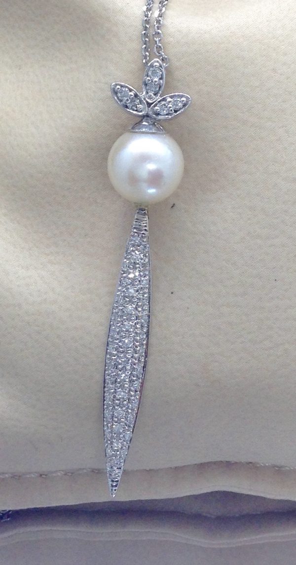 14k White Gold Necklace 8.5 mmSouth Sea Pearl with 1.00 Ct Diamond Design with 14k Chain on a pillow
