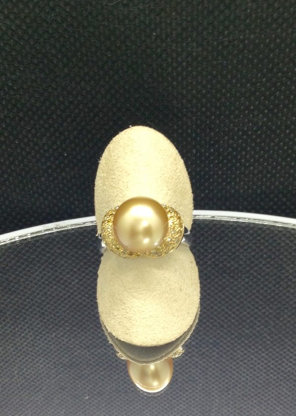 Flamboyant 12mm Golden South Sea Pearl with 0.74 Ct Canary Diamonds 18k White Gold Ring on a fake finger (front view)