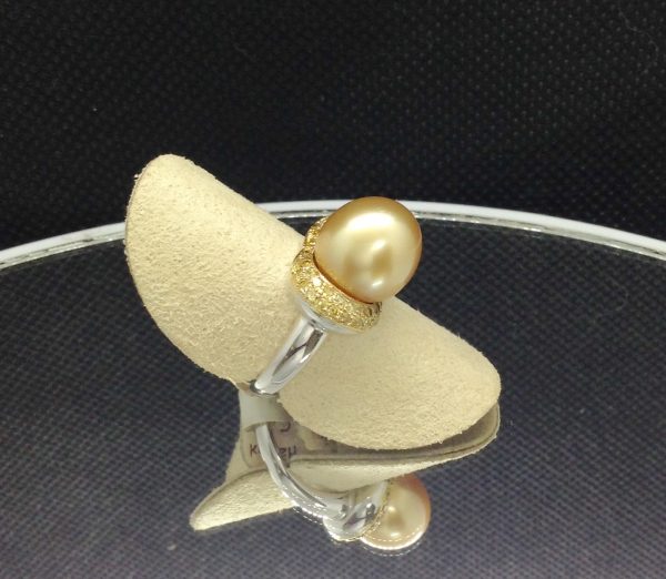 Flamboyant 12mm Golden South Sea Pearl with 0.74 Ct Canary Diamonds 18k White Gold Ring on a fake finger (side view)