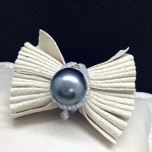Magnificent 12mm Tahitian Pearl with 1.40 Ct Diamond 18k White Gold Ring on a pillow
