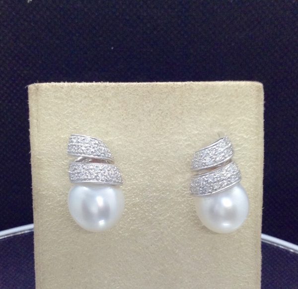 14mm South Sea Pearl 18k White Gold Earring with 1.25 Ct Diamond on a Twirling Design (front view)