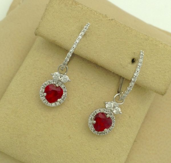 Classy 1.00 Ct Heart Shaped Ruby & 1.00 Ct Diamond Halo 14k White gold Hoops hanging on carton