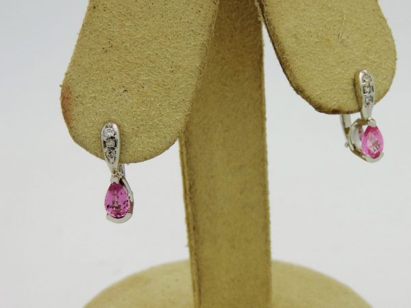 14K White Gold 0.15 Ct Diamond & 0.60 Ct Pink Topaz Short Drop Earrings on a piece of cloth
