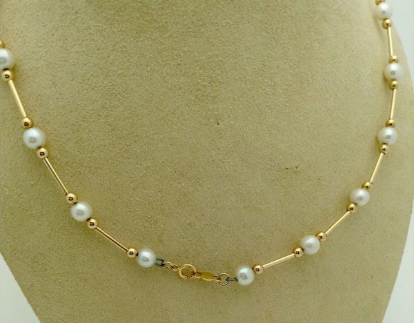 Classy 4mm Akoya Pearls w/ 14k yellow gold beads and bars on a fake neck