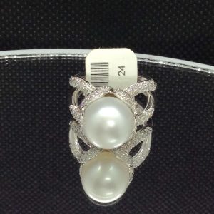 Stunning 18k White Gold Ring with a 12mm South Sea Pearl and 0.75 Ct Diamonds on a piece of glass