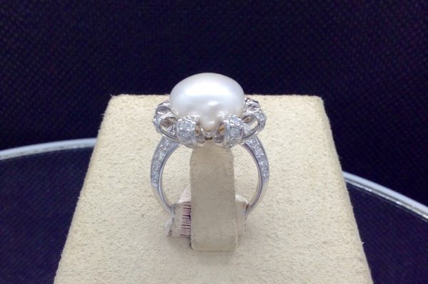 11mm Fresh Water Pearl with 1.00 Ct Diamond 18k White Gold Flower Ring on a jewelry box