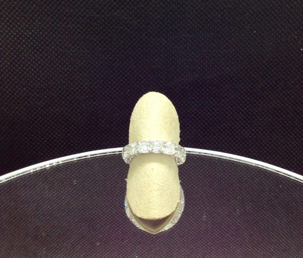 Platinum 9.10 Ct Diamond Eternity Band H/VS on a fake plastic finger (front view)