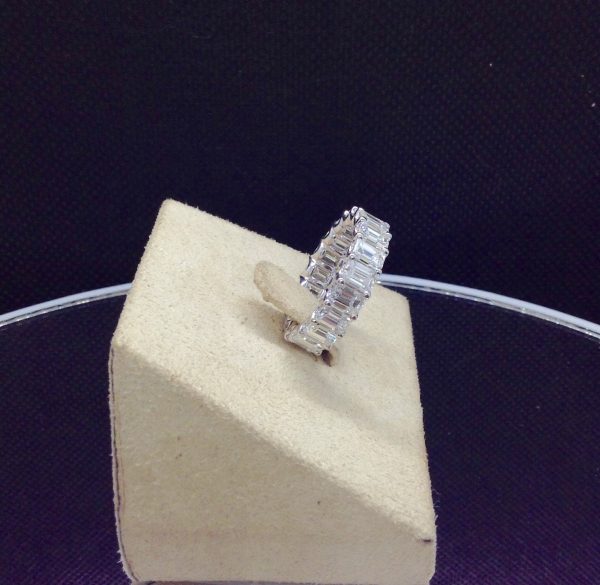 6.20 Ct Diamond Eternity Band in a jewelry box (side view)