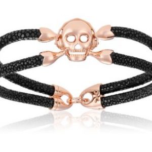 Skull bracelet made with rose gold and black strap