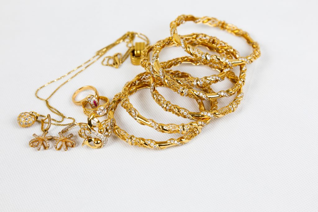 Multiple golden bracelets
